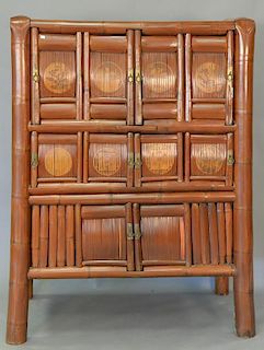 Bamboo Chinese style cabinet. ht. 61in., wd. 43in., dp. 22 1/2in.