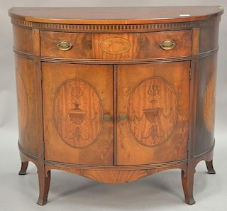 Mahogany half round cabinet with fitted drawer interior. ht. 34in., wd. 40in.; dp. 20in.