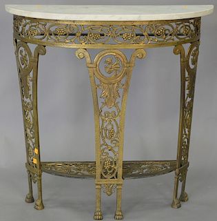Iron marble top demilune table. ht. 32in., wd. 32 1/2in., dp. 12in.