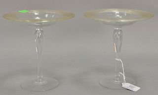 Pair of Steuben crystal threaded compotes, colorless with amber threading and bubbles in dish. ht. 7in.
