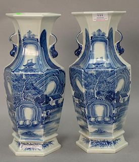 Pair of blue and white porcelain vases with landscape scenes. ht. 14in.
