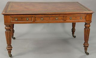 George IV oak writing table with tooled leather top and three drawers on either side, 19th century. ht. 30in., top: 36" x 55"