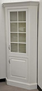 Pair of custom contemporary corner china cabinets. ht. 84in., wd. 38in.