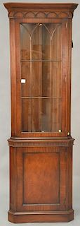 Baker mahogany corner china cabinet with glass shelves. ht. 88in., wd. 27in.