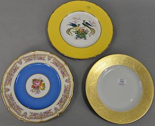 Three sets of porcelain plates including set of twelve LImoges dinner plates, set of eight Ovington Bro's. plates and a group of six...