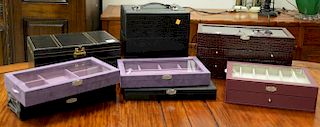 Eight leather fitted jewelry boxes, six are by Prestige. ht. 1 3/4in., lg. 15in. to ht. 12in., lg. 12in.