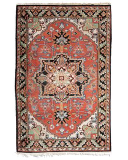 A Heriz area rug