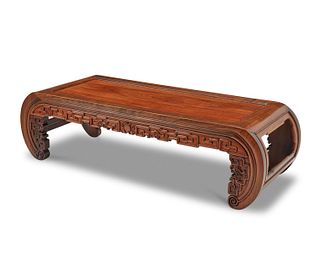 A Chinese carved wood kang table