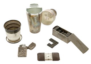 A group of miniature travel items
