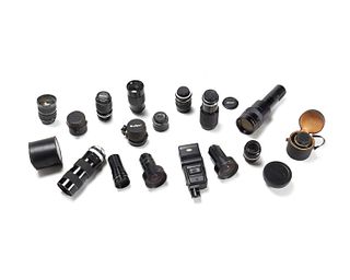 A group of assorted camera lenses