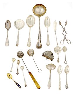 A group of sterling silver flatware and holloware