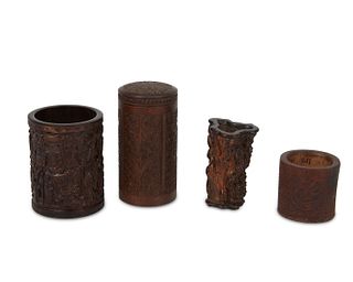 A group of East Asian carved wood vessels