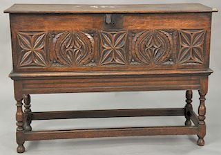 Carved oak dovetailed lift top chest on frame. ht. 31in. wd. 45in. dp. 16in.