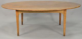 Continental fruitwood oval dining table. ht. 30in., top: 55" x 85"