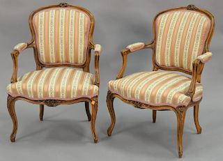 Pair of Louis XV style armchairs with custom silk upholstery in excellent condition.