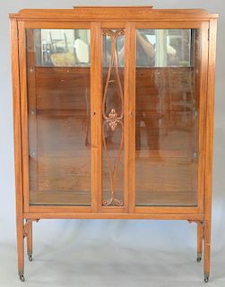 Mahogany china cabinet with bellflower inlays. ht. 68in., wd. 48 1/2in., dp. 15 1/2in.