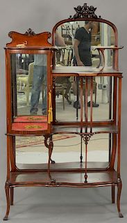 Mahogany Victorian etagere with bowed glass curio cabinet. ht. 68in., wd. 38in., dp. 13in.