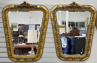 Pair of gold beveled mirrors. ht. 36 1/2"