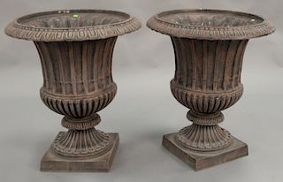 Pair of reproduction iron urns. ht. 29in. dia. 25in.