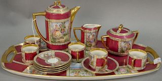 Czechoslovakian porcelain coffee set with tray, coffee pot, creamer, sugar, cups, and saucers. tray: lg. 18 1/2in.