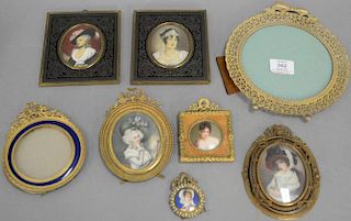 Eight brass and bronze French and Victorian frames, six with painted portraits of women. 2 1/4" x 1 3/4" to 8 1/2" x 7 3/4"