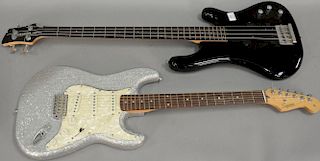 Two guitars including Fender Stratocaster Squier Olympic? with case (lg. 38 1/2in.) and a Hartke bass guitar (lg. 44in.)