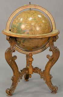 Globe on carved wood base. ht. 34in., dia. 25in.