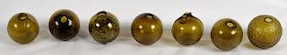 Group of Seven Amber Glass Target Balls