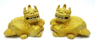 Pair of Chinese Pottery Foo Dogs.