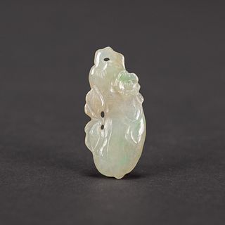 A CARVED JADE PENDANT 