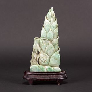 A CHINESE CARVED JADEITE BAMBOO SHOOT WITH STAND 