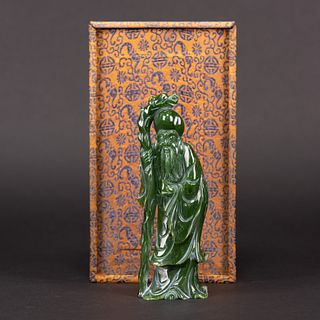 A CHINESE CARVED SPINACH GREEN JADE FIGURE OF SHOULAO 