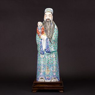 A FAMILLE ROSE FIGURE OF FU XING WITH CHILD 