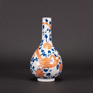 A IRON RED DECORATED BLUE AND WHITE 'DRAGON' VASE, QIANLONG MARK
