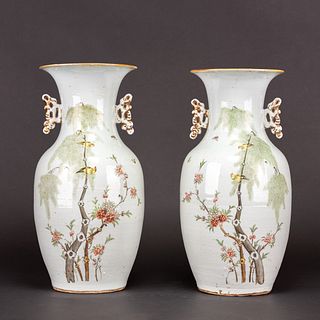 A PAIR OF FAMILLE ROSE 'FLOWER AND BIRD' VASES