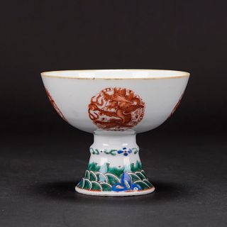 A FAMILLE ROSE  AND IRON-RED 'DRAGON-MEDALLION' STEM BOWL 