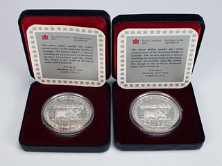 TWO 1985 CANADIAN MINT 100TH ANNIVERSARY NATIONAL PARKS SILVER DOLLAR COINS 