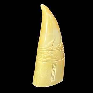 A Scrimshaw Whale's Tooth Carving