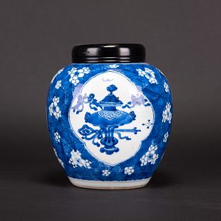 A BLUE AND WHITE 'PRUNUS' JAR WITH COVER, KANGXI PERIOD 