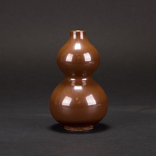A PERSIMMON-GLAZED YAOZHOU DOUBLE-GOURD VASE