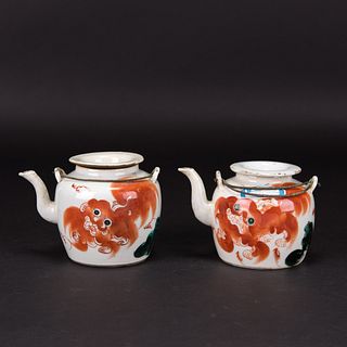 A GROUP OF 2 CHINESE IRON-RED 'LION' TEAPOTS AND COVERS, GUANGXU PERIOD 