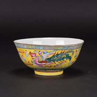 A YELLOW-GROUND FAMILLE ROSE 'DRAGON AND PHOENIX' BOWL, GUANGXU PERIOD 