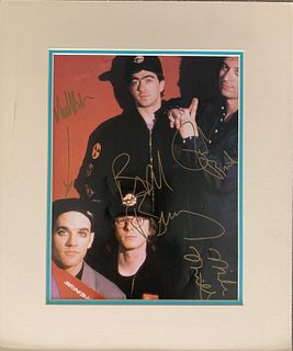 R.E.M. signed photo