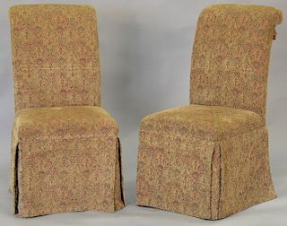 Six upholstered dining chairs.