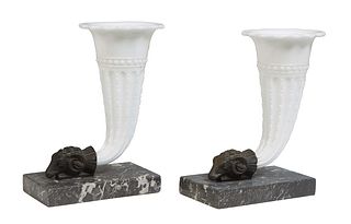 Pair of Czechoslovakian Rams' Head Milk Glass Cornucopia Vases, 20th c., on rectangular figured black marble bases, H.-7 1/2 in., W.- 5 3/4 in., D.- 3