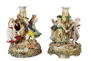 Pair of German Porcelain Figural Vases, 20th c., by Von Schierholz, with dancing 19th c. costumed couples around a tree form vase with relief flowers,