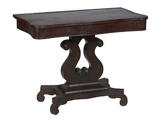 American Classical Carved Mahogany Side Table, 19th c. The serpentine top on a pierced lyre form support to a sloping socle quadruped base, H.- 27 1/2