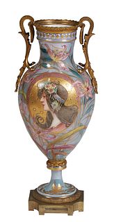 Sevres Style Bronze Mounted Baluster Porcelain Vase, 20th c., in pale blue with gilt and floral decoration, and bronze handles flanking a reserve of a