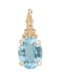 14K Yellow Gold Pendant, with a large app. 20 carat oval blue topaz, with a pierced opening bale, H.- 1 1/2 in., W.- 5/8 in. Provenance: The Estate of