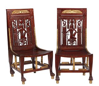 Pair of Gilt Pierced Carved Mahogany Egyptian Revival Side Chairs, 19th c., the crest with gilt carved double peacock and sphere, over a pierced carve